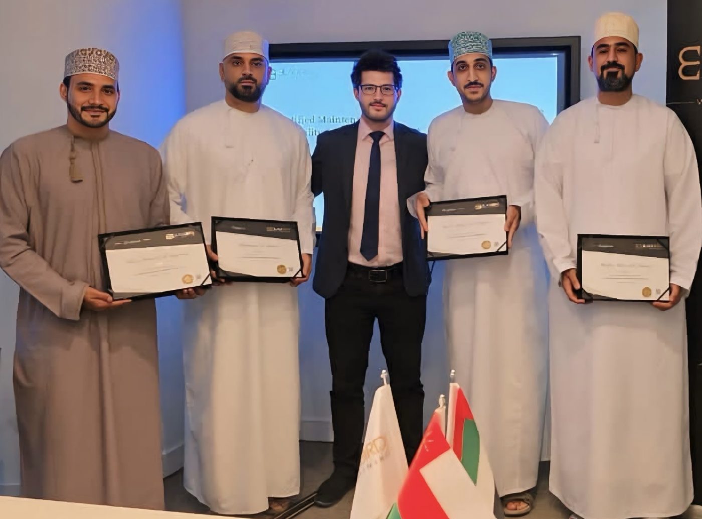 Training group holding certificates